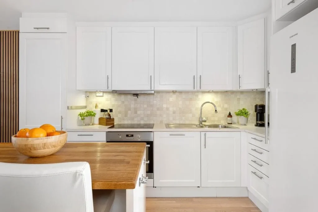 A beautiful and elegent white cabinetry with white light can enhances its beauty.